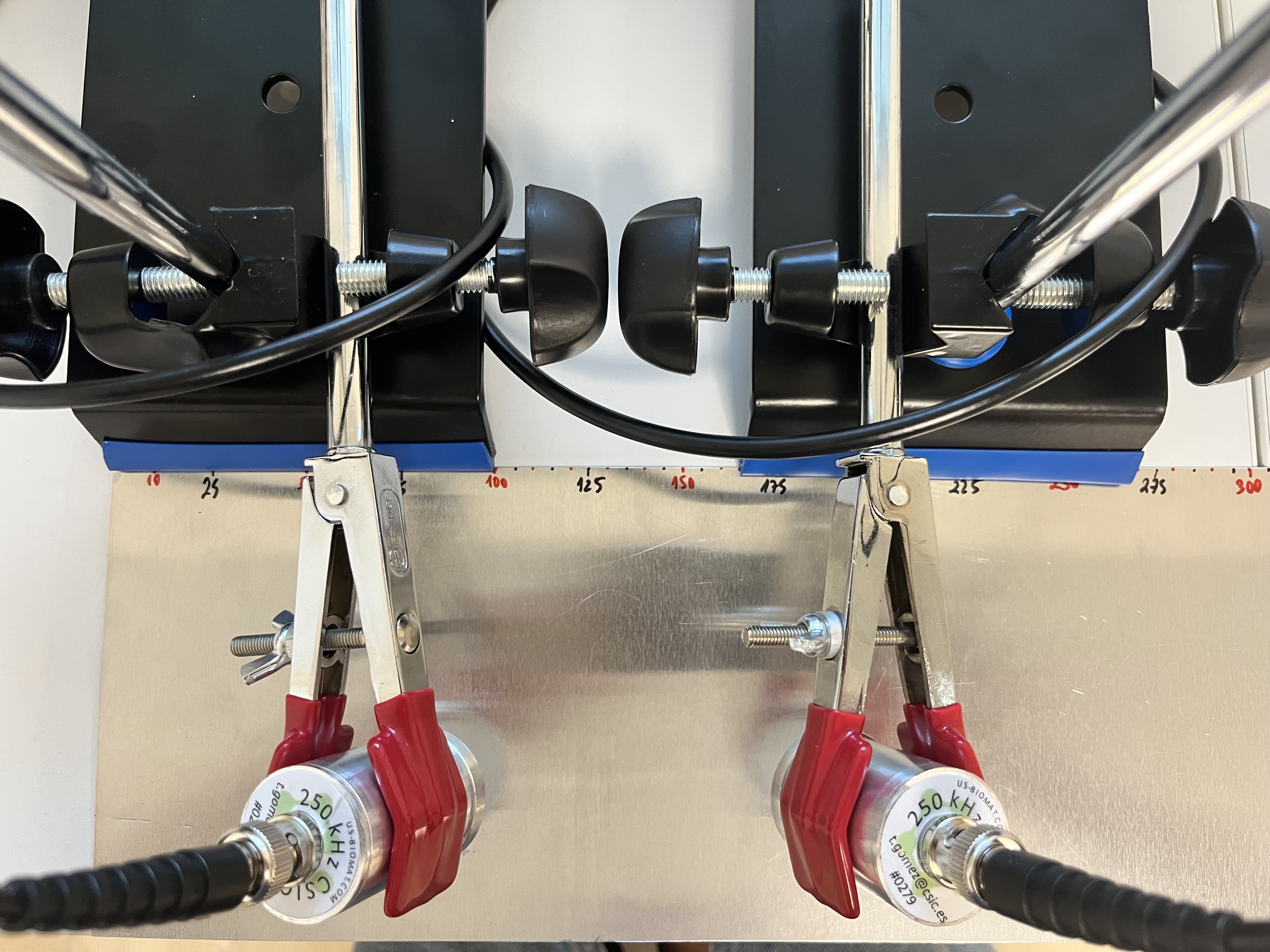 Contactless ultrasonic measurements in composites with magnetic microwires